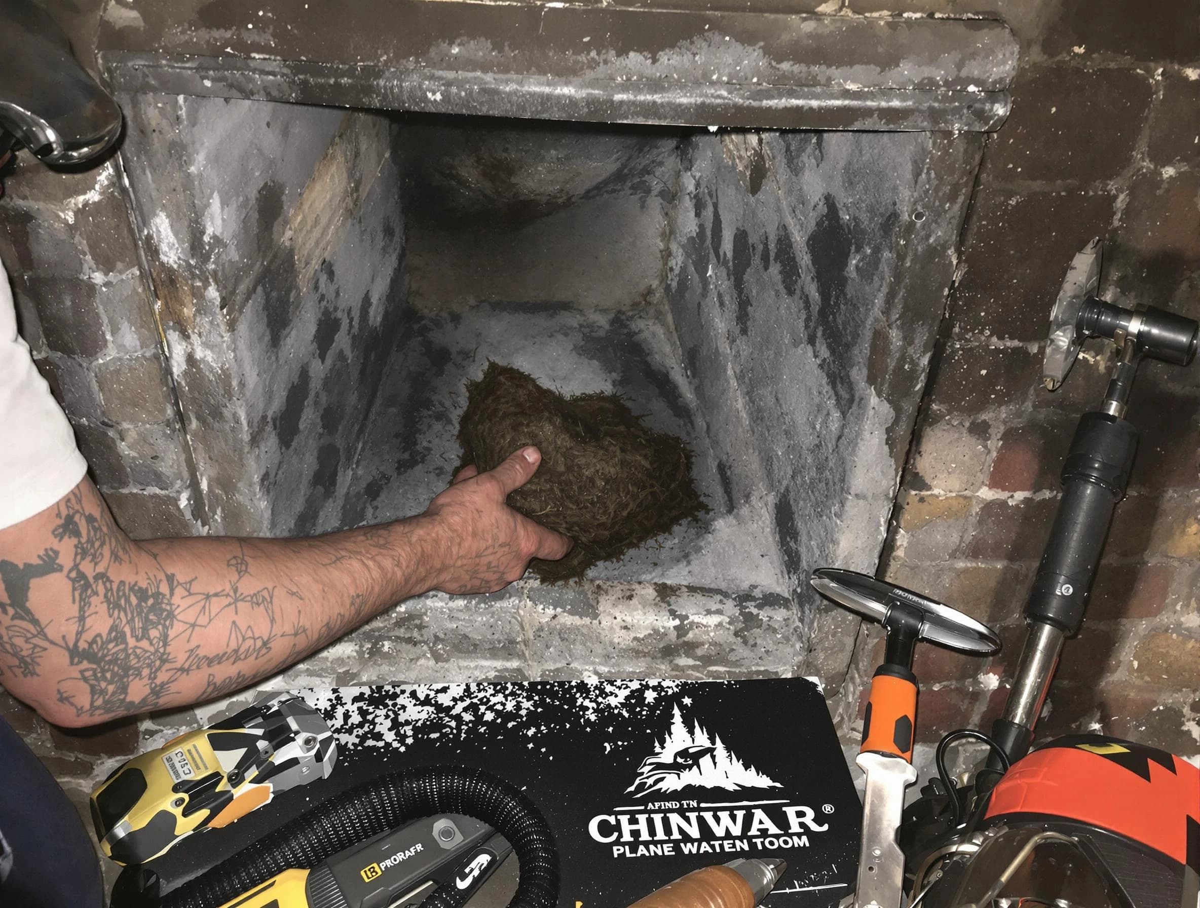 Commerce City Chimney Sweep safely removing debris and screening chimney in Commerce City, CO